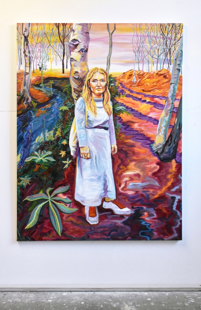 An oil painting by Julia of a young woman in a white dress, standing in a colourful landscape